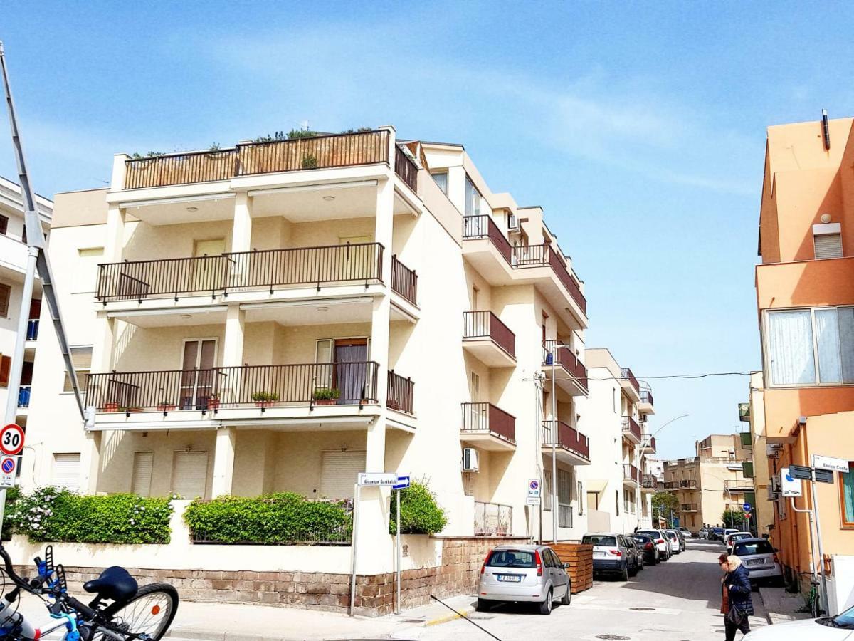 Family Apartment On The Beach Альгеро Экстерьер фото